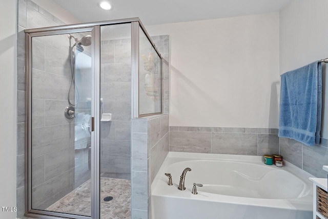 bathroom with independent shower and bath