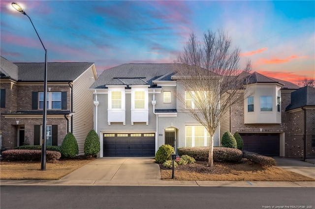 view of front of house with a garage