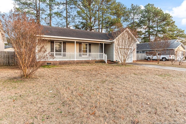 single story home with a front lawn and covered porch