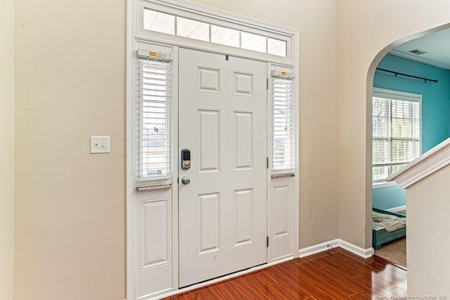 entrance foyer featuring hardwood / wood-style flooring