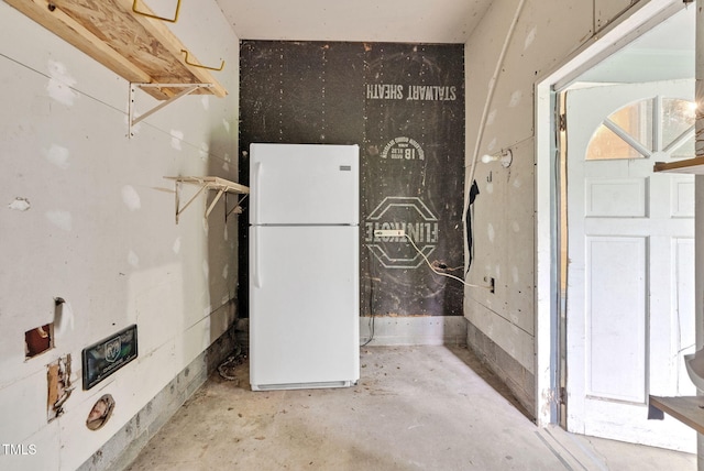 bathroom with unfinished concrete flooring