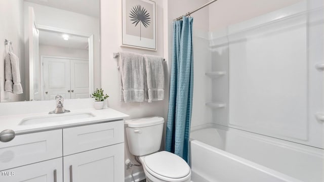 full bathroom featuring vanity, toilet, and shower / bath combo with shower curtain