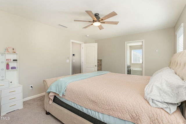 bedroom with light carpet and ceiling fan