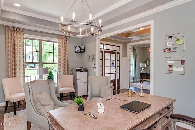 office area with a raised ceiling, ornamental molding, a chandelier, and light hardwood / wood-style flooring