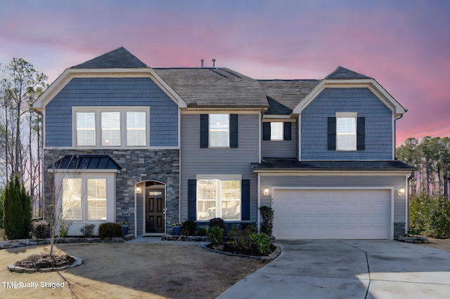 view of front of home featuring a garage