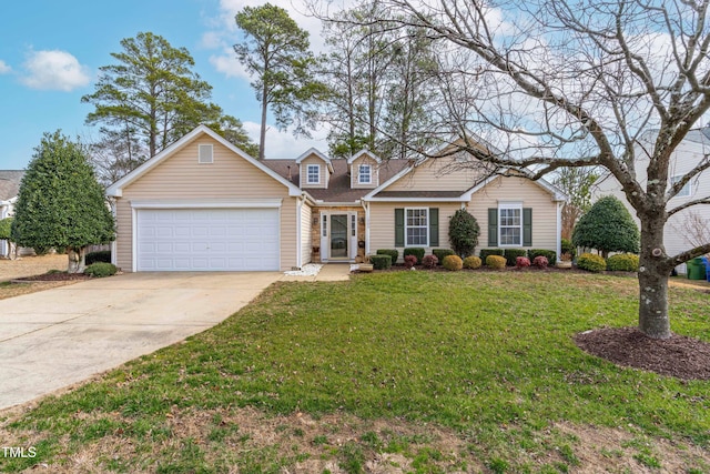 view of front of property with a garage and a front yard