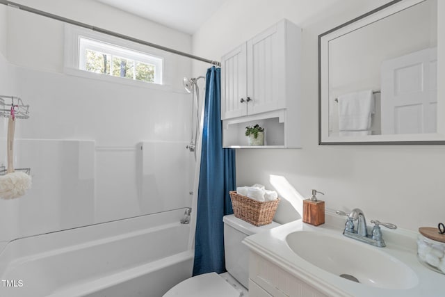 full bathroom featuring shower / bathtub combination with curtain, vanity, and toilet