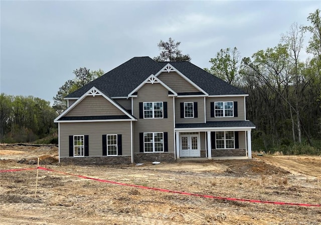 craftsman-style house with french doors