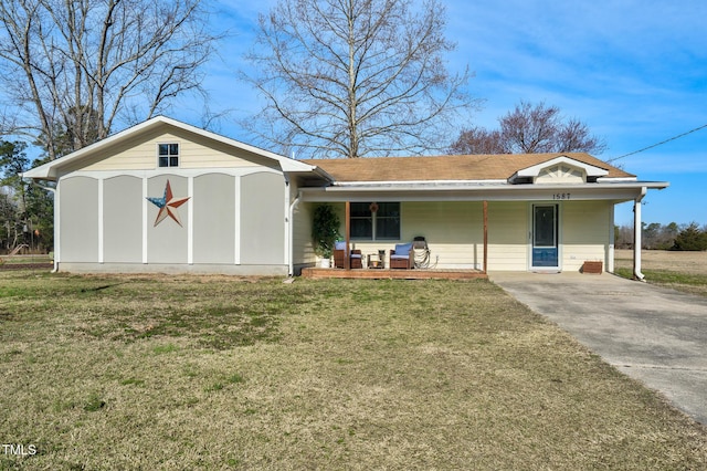 single story home with covered porch and a front lawn