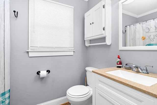 full bath featuring toilet, a shower with curtain, ornamental molding, and vanity