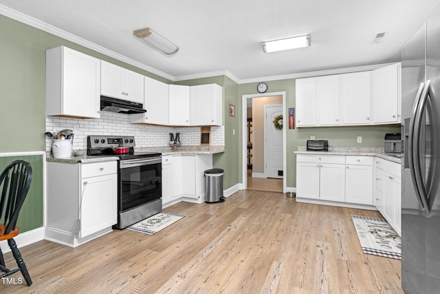 kitchen featuring light wood finished floors, stainless steel appliances, crown molding, under cabinet range hood, and white cabinetry