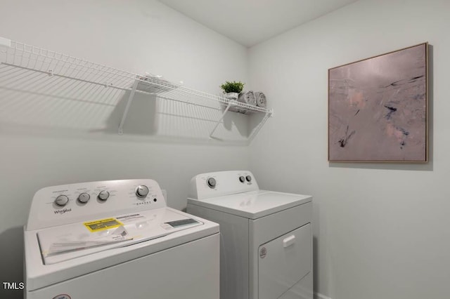laundry area featuring washer and clothes dryer