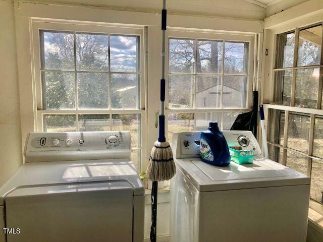 washroom with laundry area and washer and clothes dryer