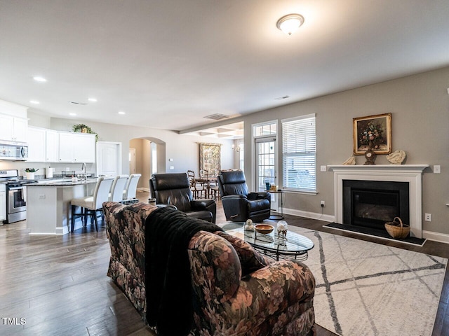 living room with light hardwood / wood-style floors