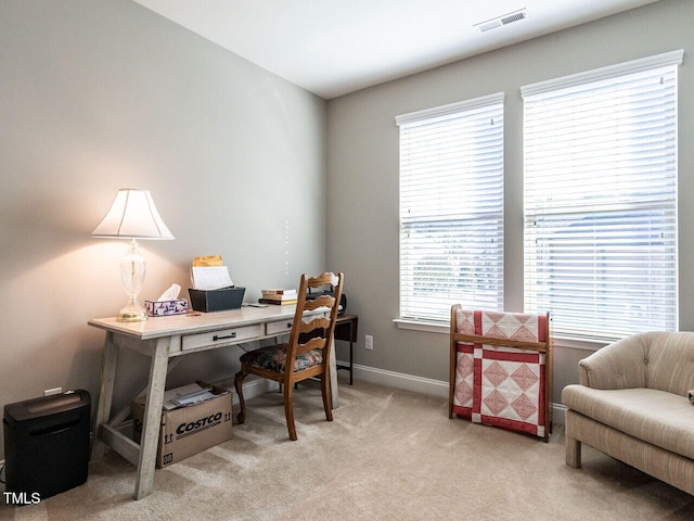 office space with light carpet