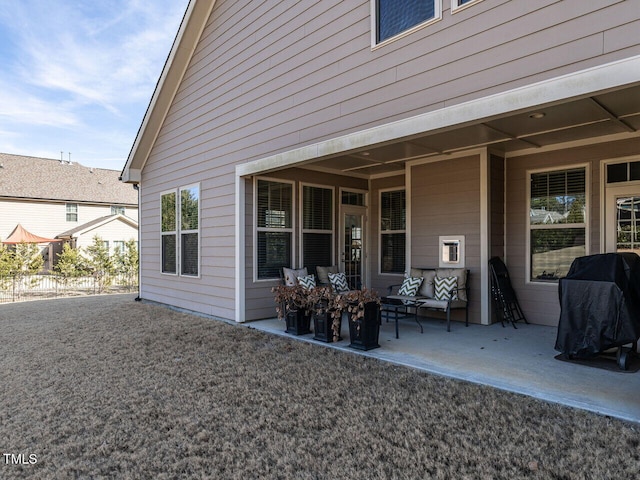 rear view of property featuring a patio