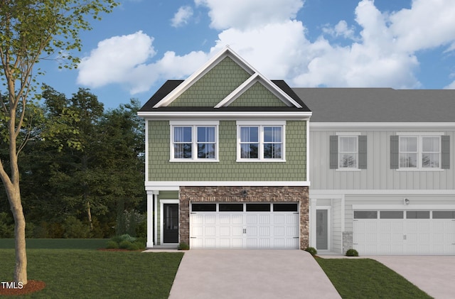 view of front of home featuring a garage and a front yard