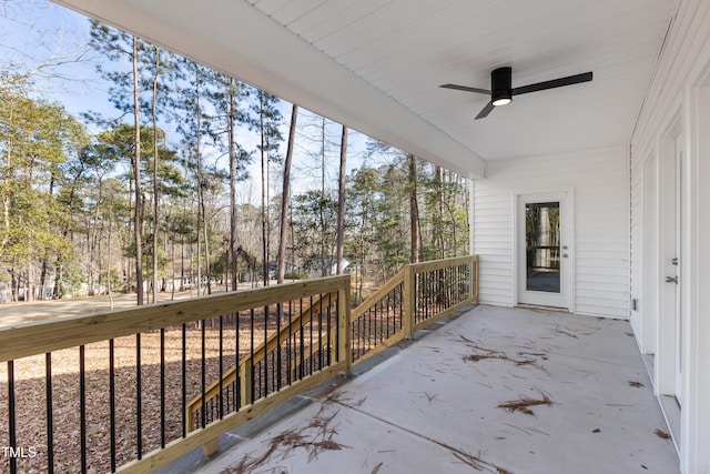 wooden deck with ceiling fan