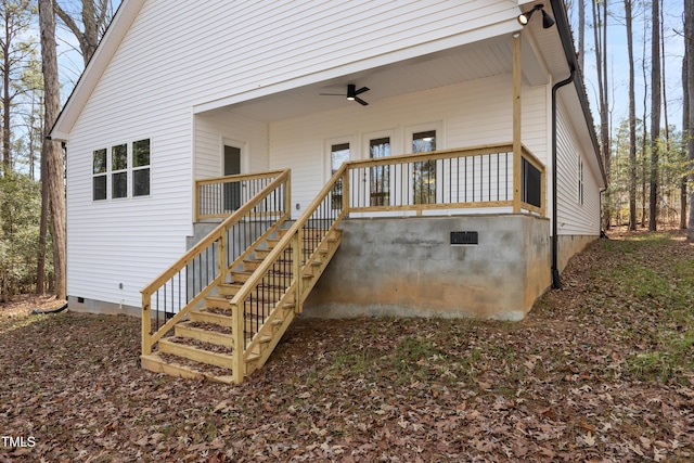 rear view of house with ceiling fan