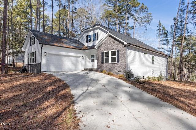 view of front of property with a garage