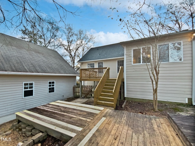 rear view of house with a deck