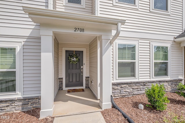 2708 Chert Ln, Raleigh, NC 27610 - view of exterior entry with stone siding