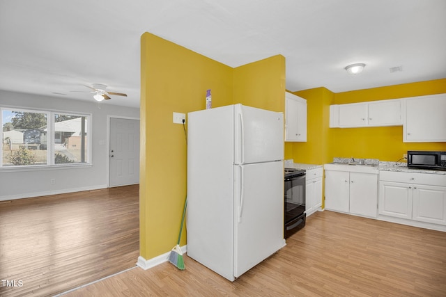 kitchen featuring ceiling fan, light hardwood / wood-style flooring, black appliances, and white cabinets