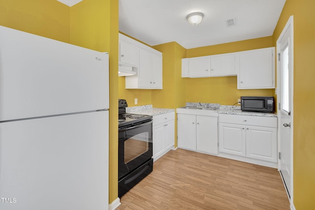 kitchen featuring sink, white cabinets, light hardwood / wood-style floors, and black appliances