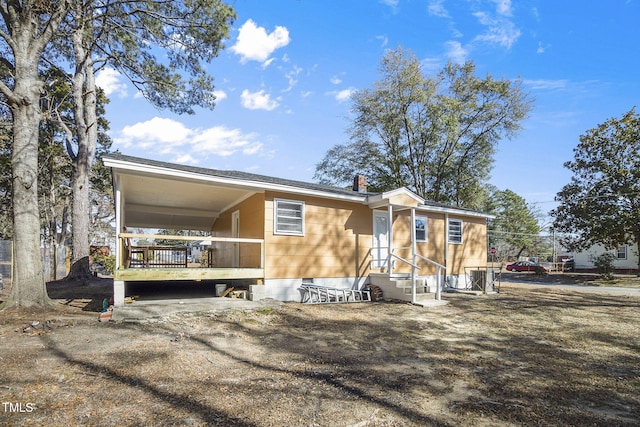 view of front of home with a deck