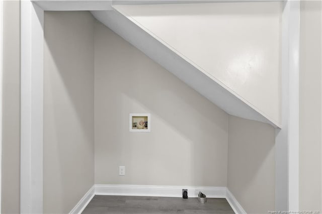 laundry room featuring hardwood / wood-style flooring and hookup for a washing machine