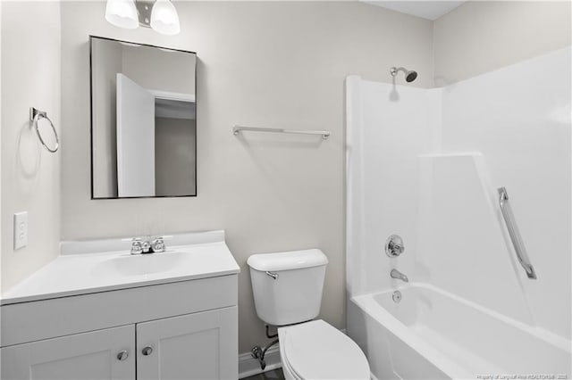 full bathroom with vanity, bathtub / shower combination, and toilet