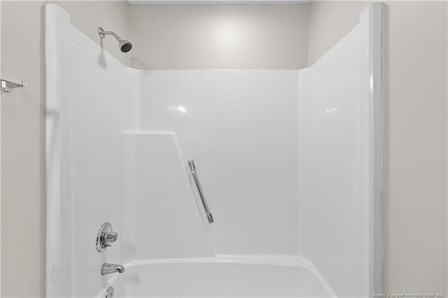 bathroom with shower / bathing tub combination