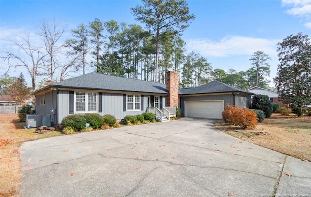 single story home featuring a garage