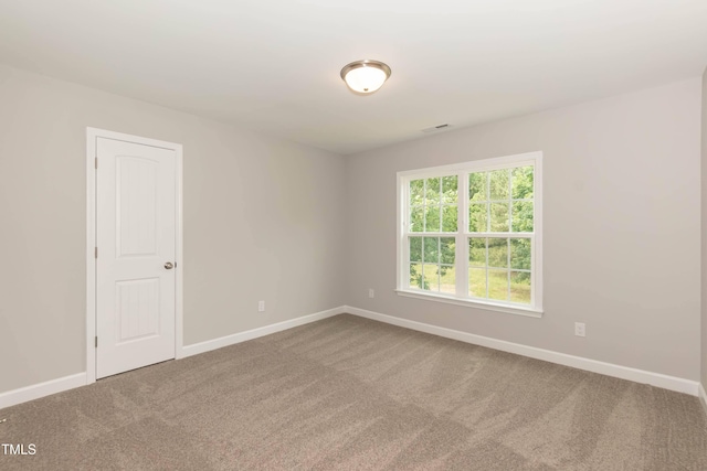 view of carpeted spare room