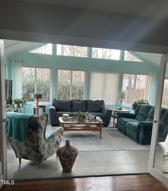 sunroom with vaulted ceiling and french doors