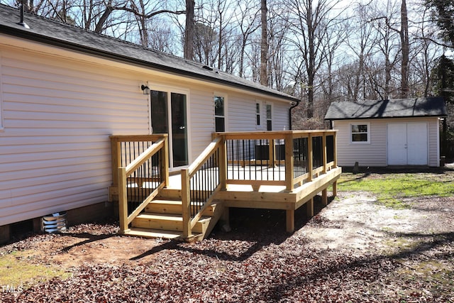 wooden deck with a storage shed