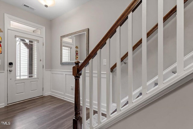 foyer featuring dark wood-type flooring