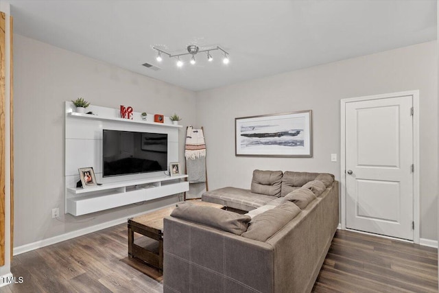 living room with dark wood-type flooring