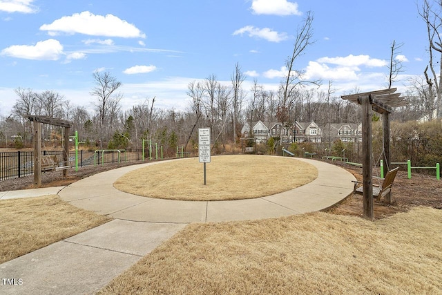 view of home's community with a lawn