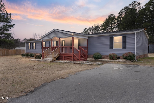 manufactured / mobile home with a porch