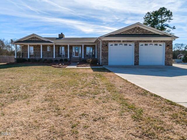 ranch-style home with a porch, a garage, and a front lawn