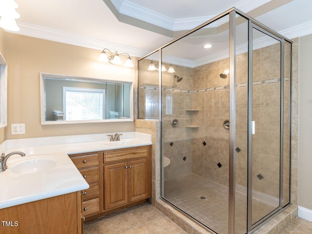 bathroom with a shower with shower door and ornamental molding