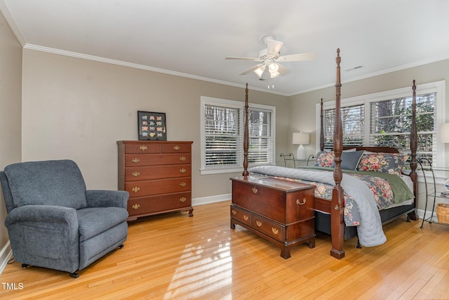 bedroom with crown molding, ceiling fan, and light wood-type flooring