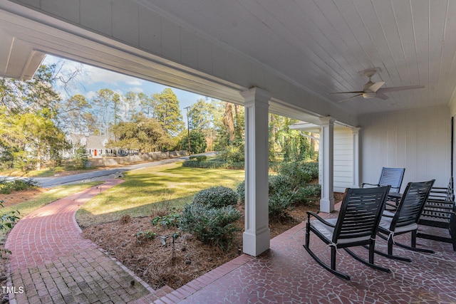 view of patio featuring ceiling fan