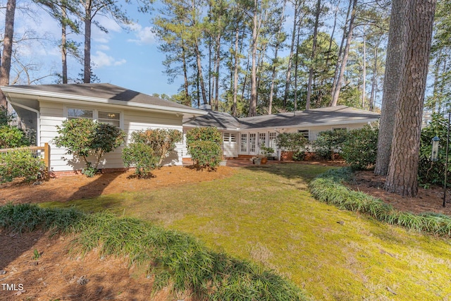 view of front of home with a front yard