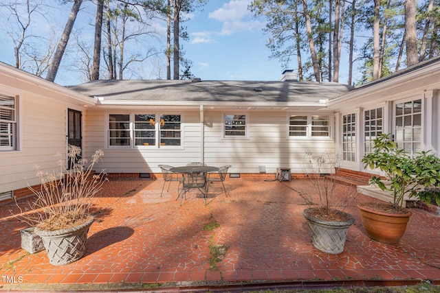 rear view of property with a patio area