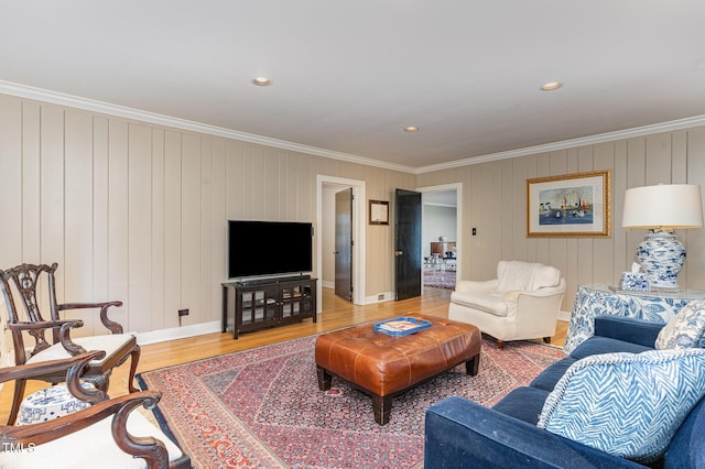 living room with crown molding and wood-type flooring