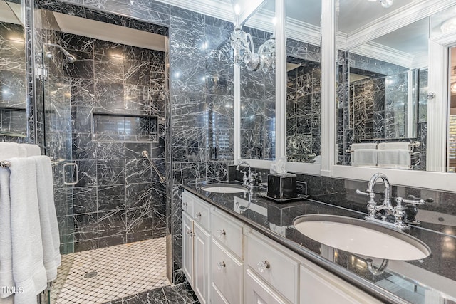 bathroom with crown molding, a tile shower, and vanity