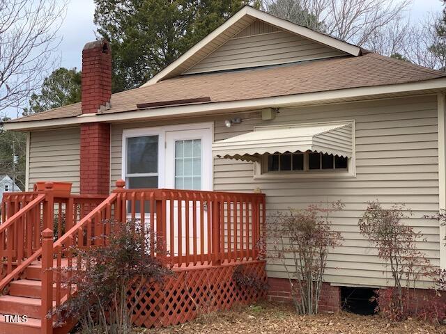 rear view of house with a deck