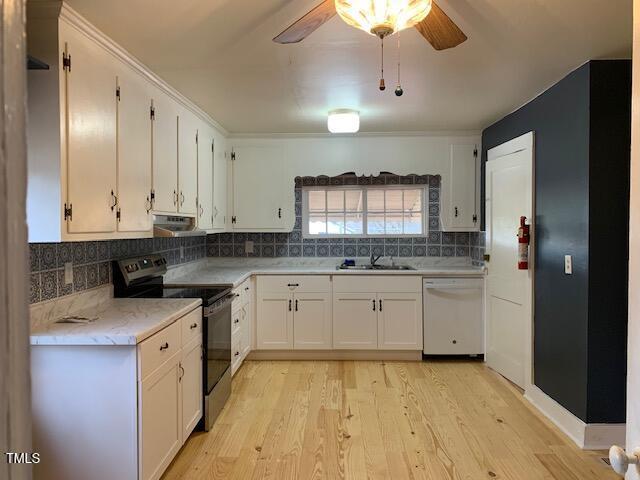 kitchen featuring sink, white cabinetry, stainless steel range with electric stovetop, dishwasher, and light hardwood / wood-style floors